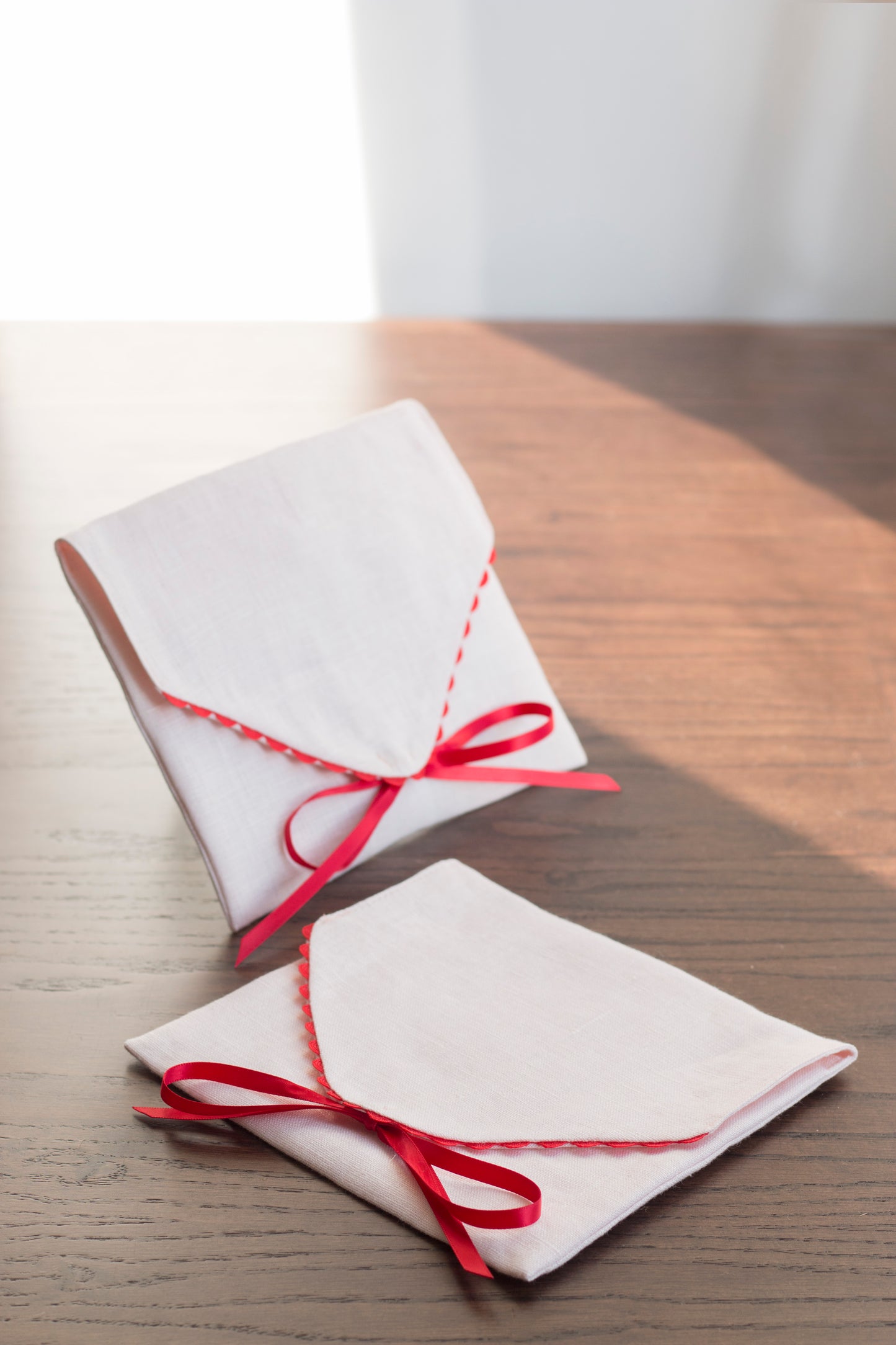 Pink linen envelope with red trim for Gifting